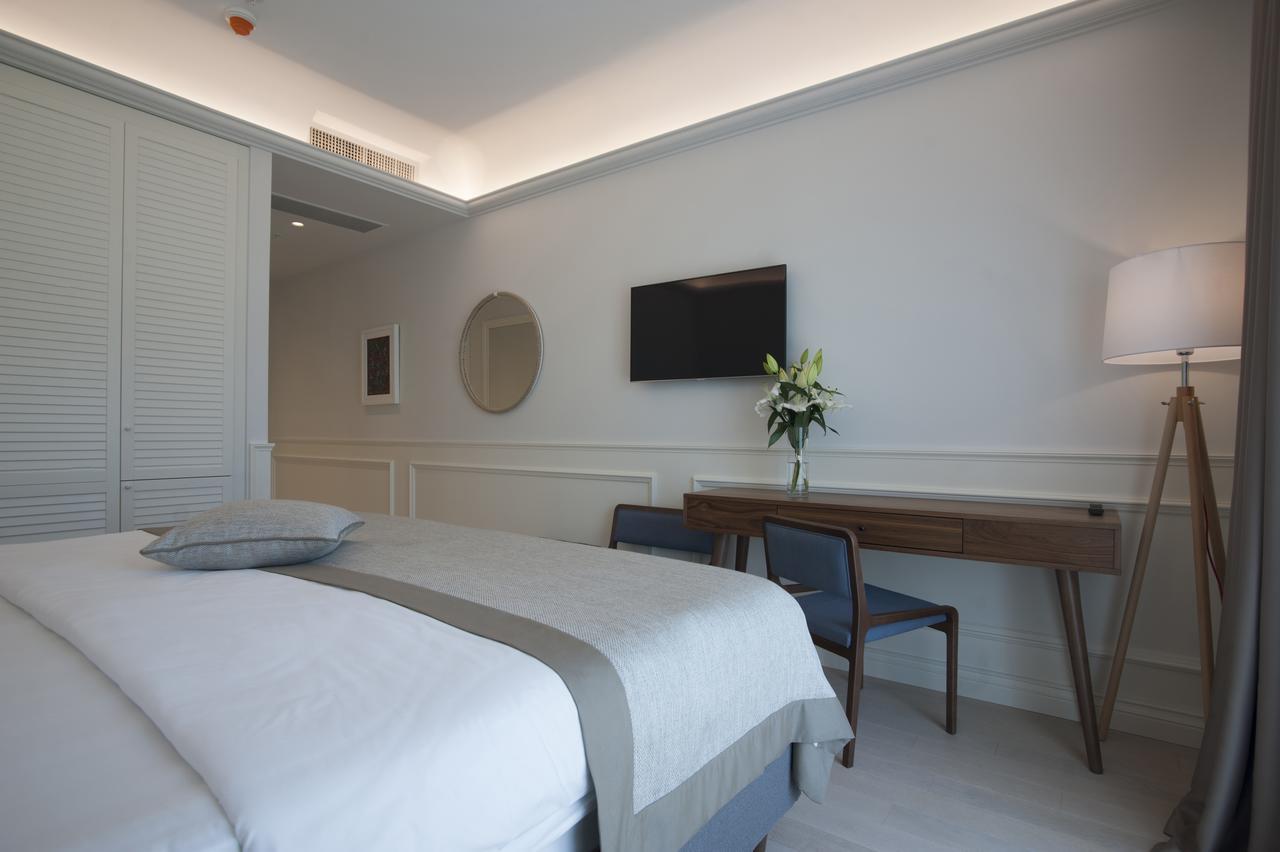 Kamer met 1 Groot Bed of 2 Aparte Bedden en Uitzicht op de Stad